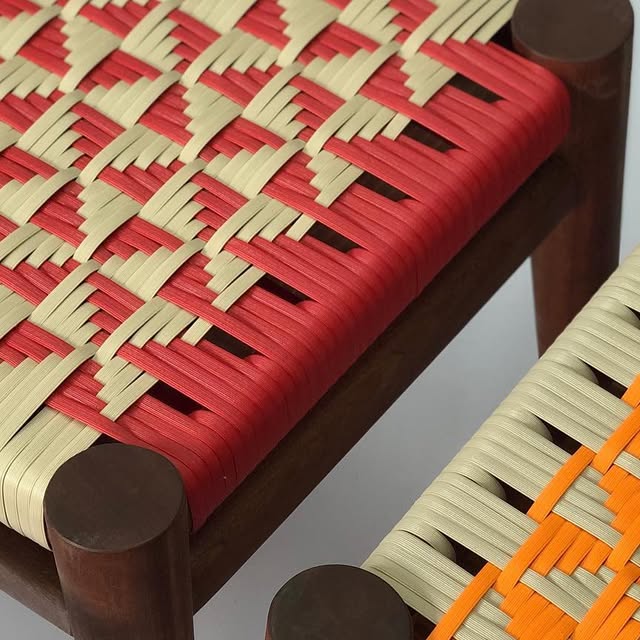 Close-up of hand-woven seat panel — cotton rope, natural tone.